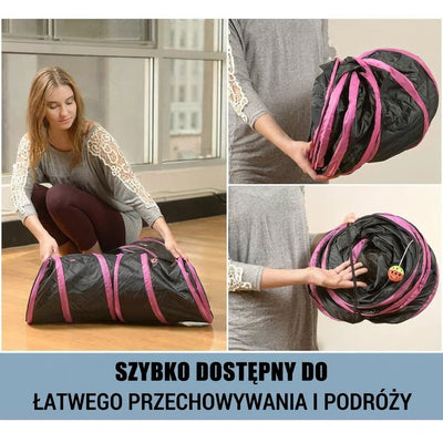 Kobieta składająca czarny tunel dla zwierząt z różowymi wykończeniami, który łatwo przechowywać i zabrać w podróż